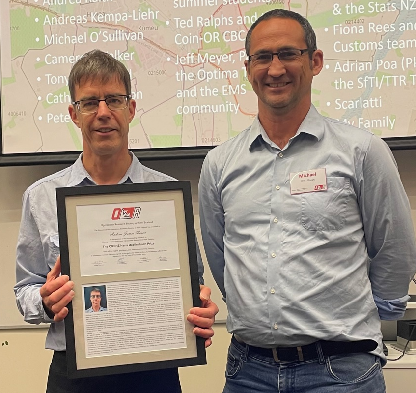 Andrew Mason with Hans Daellenbach certificate and ORSNZ president Mike O'Sullivan.